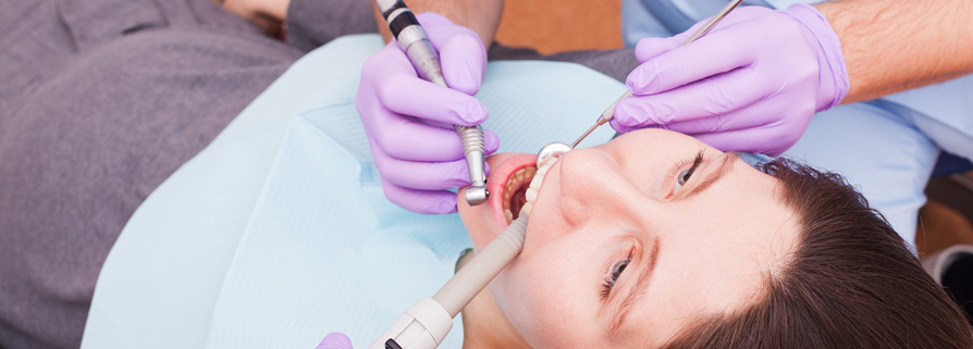Traditional dental drilling procedure for tooth decay treatment