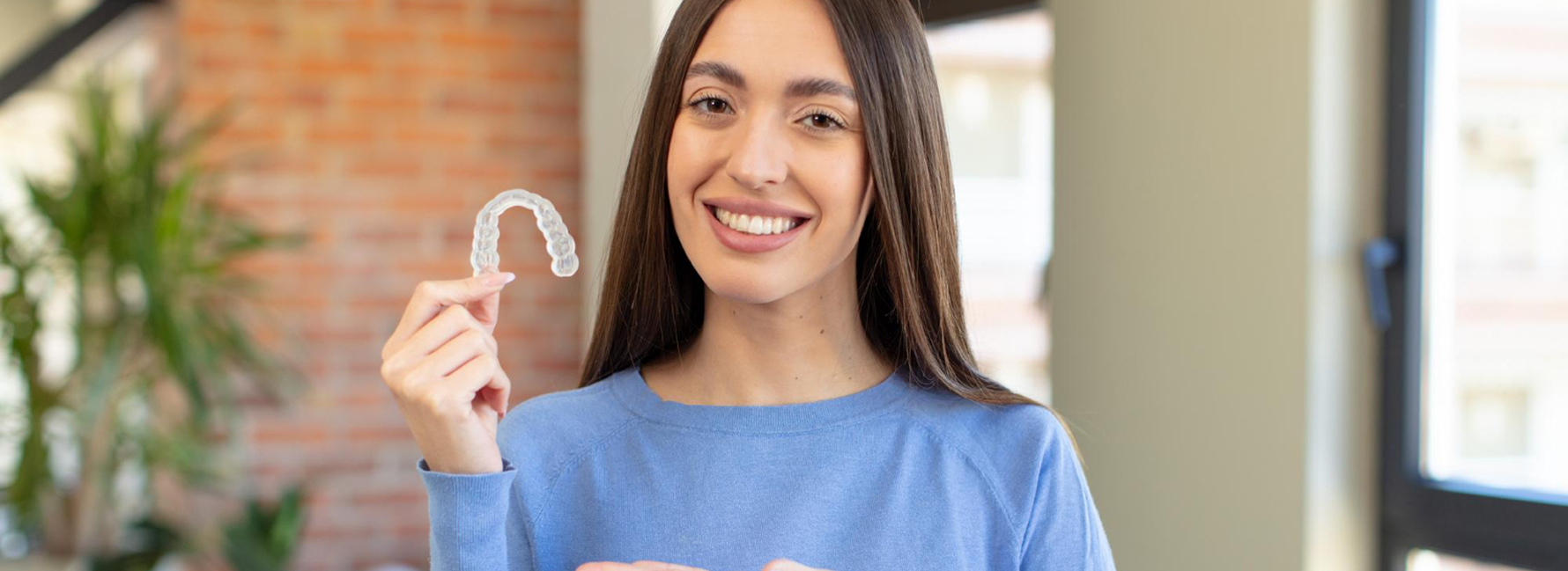 Invisalign Treatment for Adults in Beaumaris Adult patient receiving Invisalign consultation at holistic dental clinic in Beaumaris